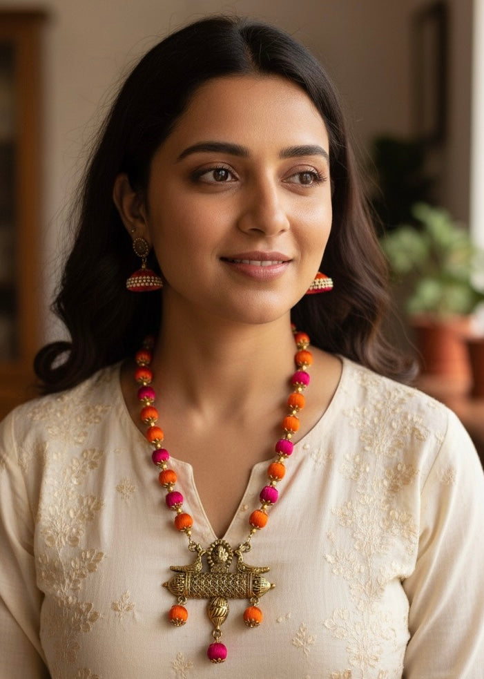 Silk thread bird pendant necklace