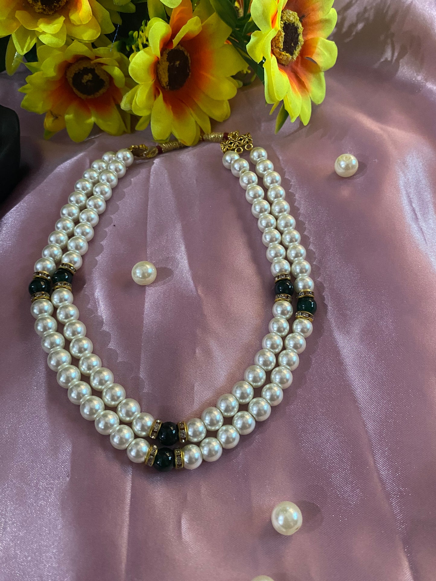 White and green pearl necklace