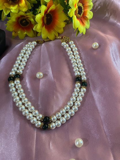 White and green pearl necklace