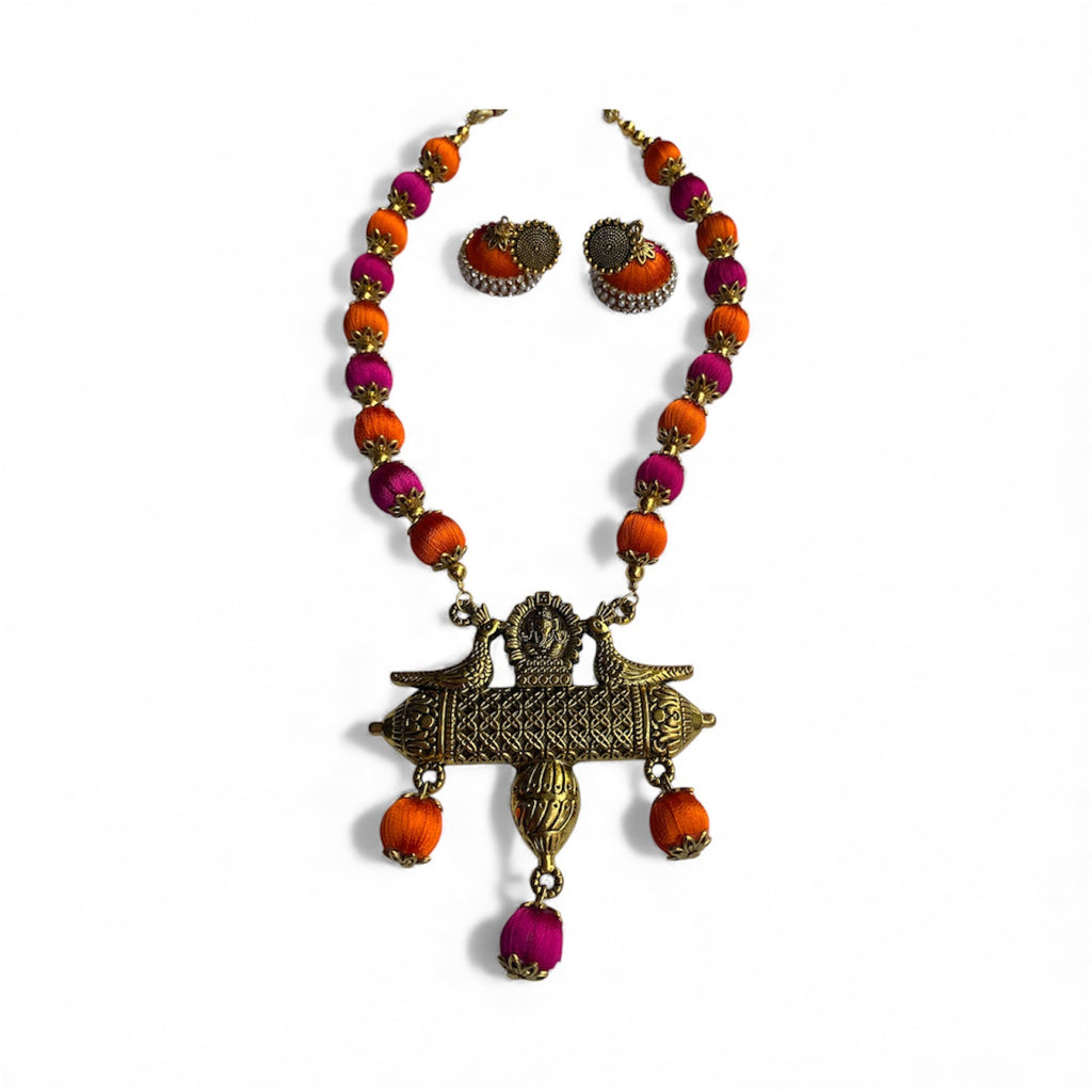 Silk thread bird pendant necklace