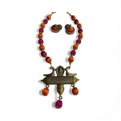 Silk thread bird pendant necklace