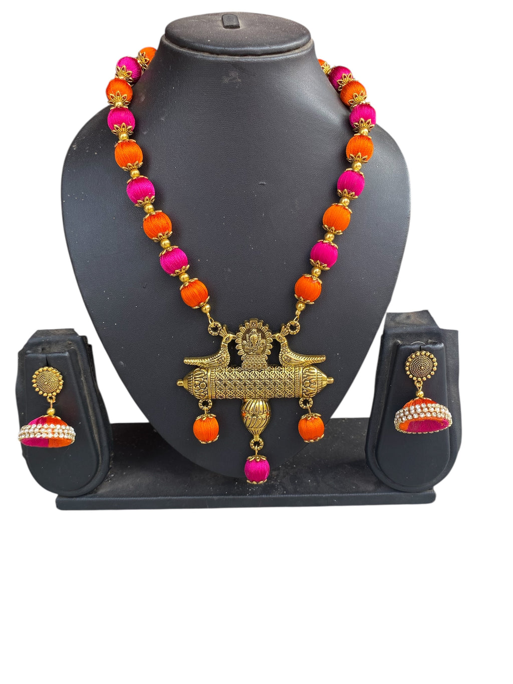 Silk thread bird pendant necklace