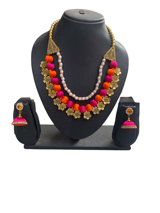 Silk thread multicoloured floral charm necklace