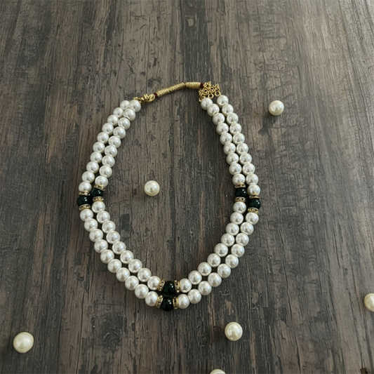 White and green pearl necklace